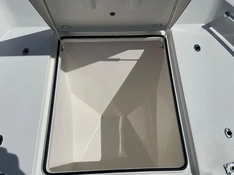 Slide: The Image of Open storage compartment of 2026 Bay Rider 269 Bay boat, showcasing spacious interior. - 30