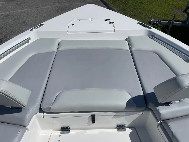 Slide: The Image of 2026 Bay Rider 269 Bay boat with cushioned seating and sleek design. - 8