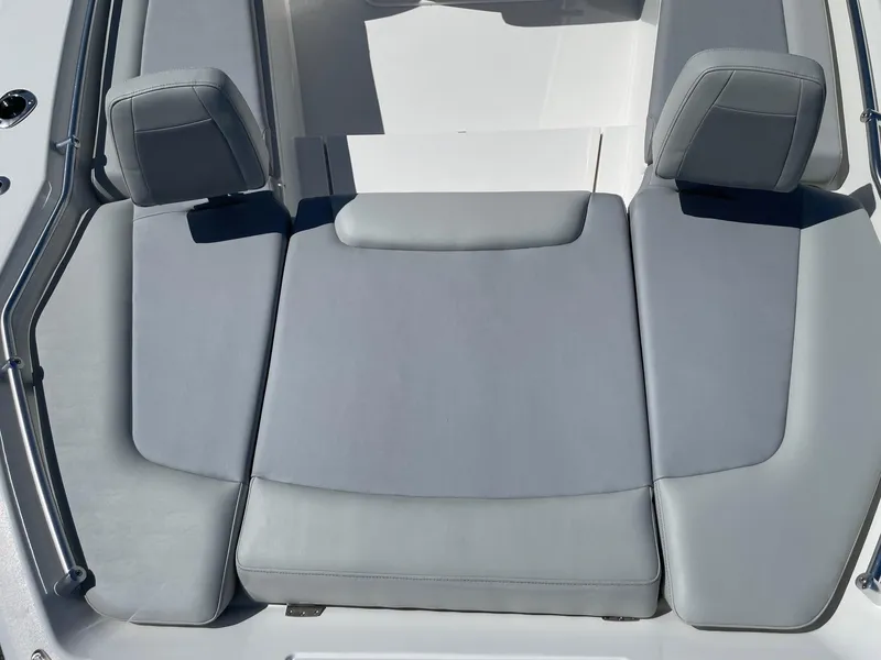 Slide: The Image of Gray cushioned seating on 2026 Bay Rider 269 Bay boat, featuring sleek design and comfort. - 9