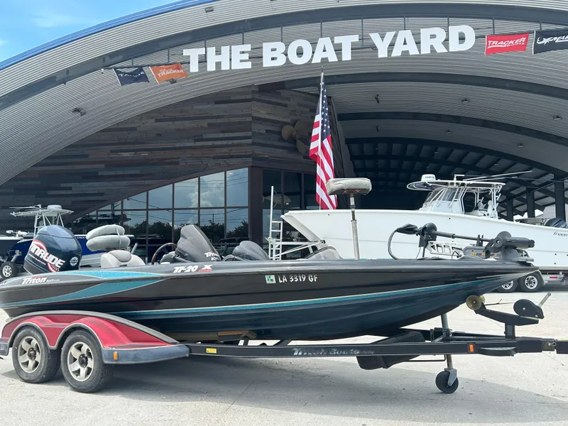 The Image of 2004 Triton Tr-20XDC boat on trailer at The Boat Yard dealership. - 0