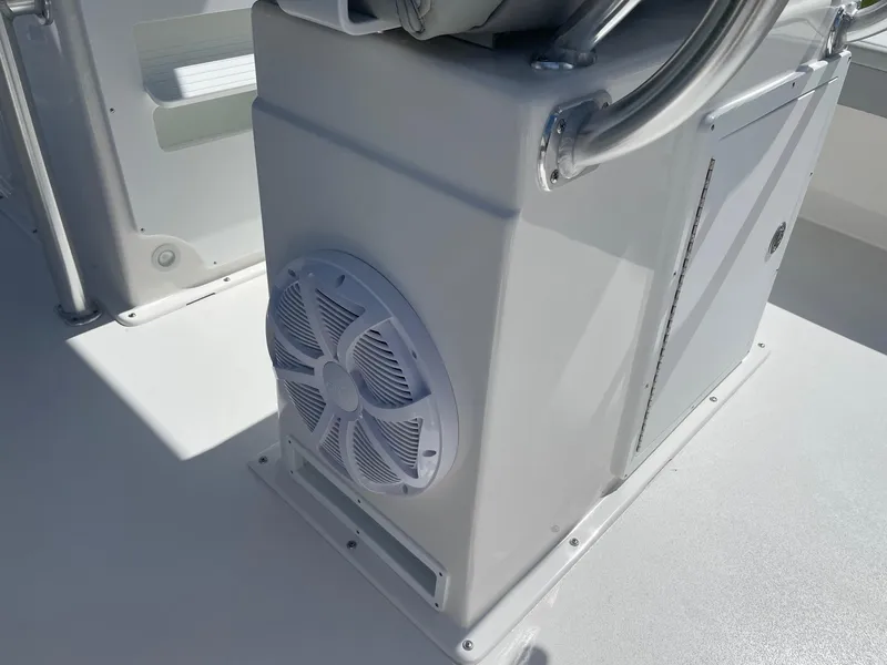 Slide: The Image of 2026 Bay Rider 269 Bay boat console with speaker and stainless steel railing. - 17