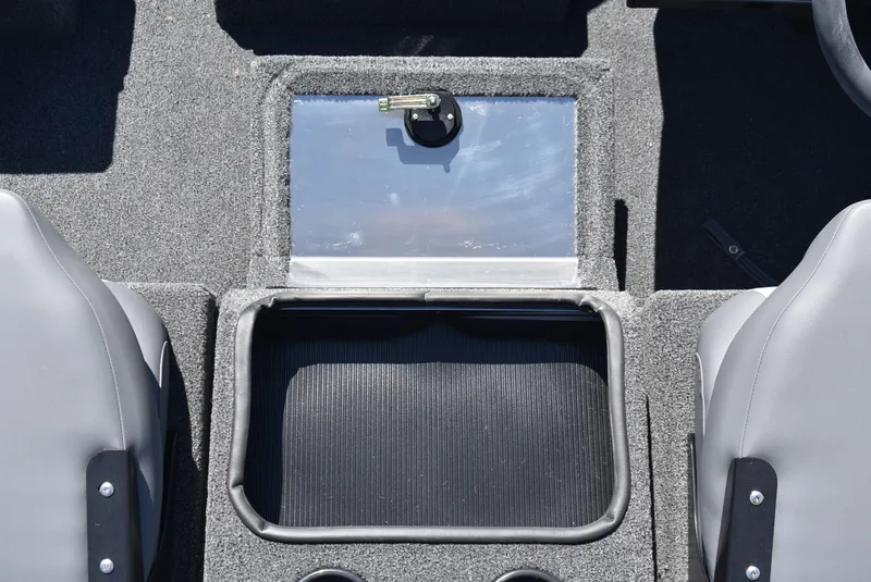 Slide: The Image of Interior view of 2025 Lowe Stinger 175 boat, featuring storage compartment and seating. - 16