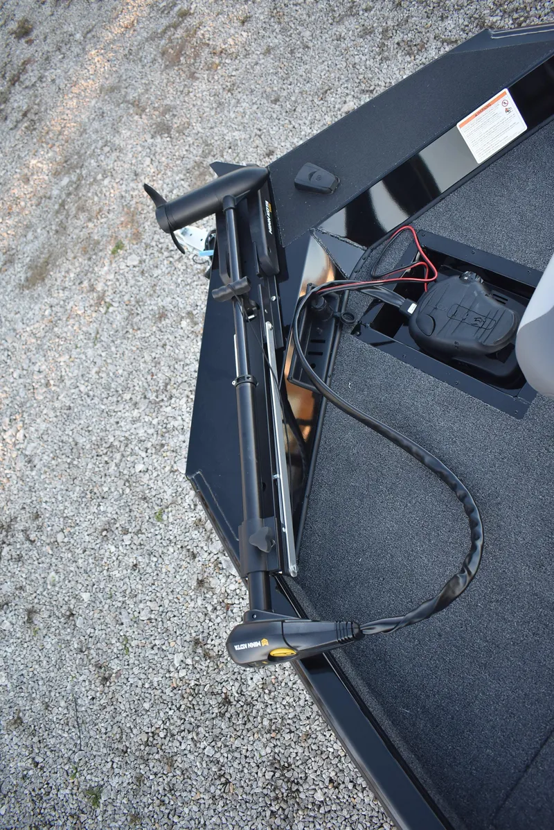 Slide: The Image of 2025 Lowe Stinger 175 boat deck with trolling motor and wiring. - 9