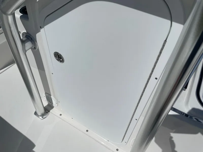Slide: The Image of 2026 Bay Rider 269 Bay boat interior with sleek white panel and metal railing. - 37
