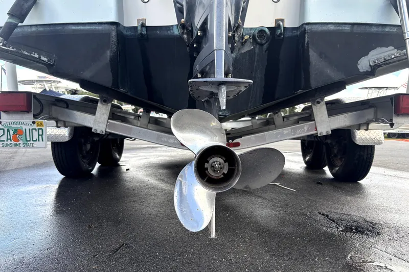 Slide: The Image of Rear view of a 2017 Robalo R200 Center Console boat on a trailer. - 10