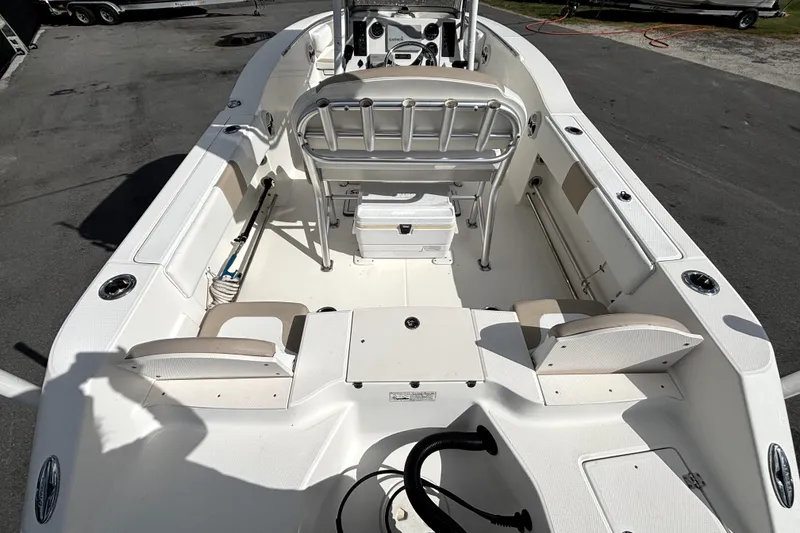 Slide: The Image of 2017 Robalo R200 Center Console boat interior with seating and console view. - 13