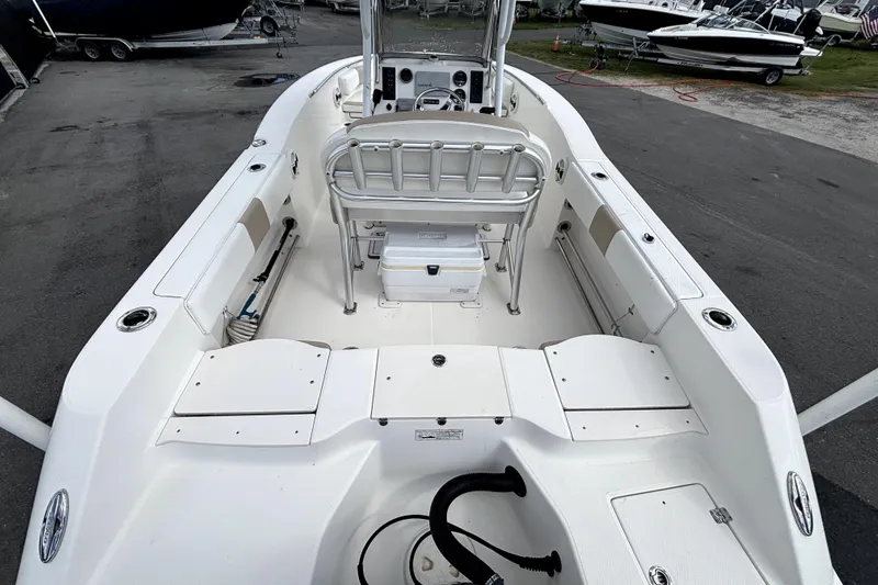 Slide: The Image of 2017 Robalo R200 Center Console boat interior with seating and storage compartments. - 14