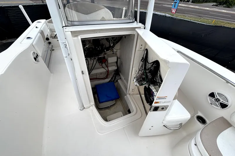 Slide: The Image of 2017 Robalo R200 Center Console boat interior with open storage compartment. - 31