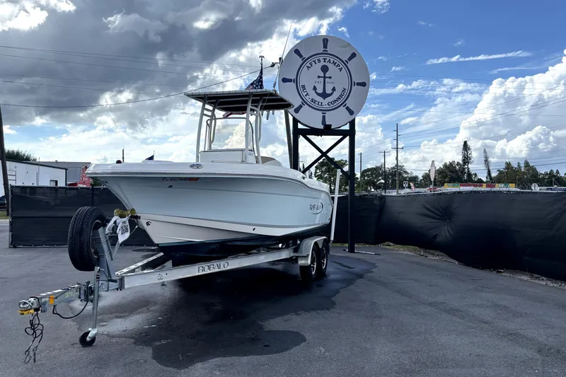 Slide: The Image of 2017 Robalo R200 Center Console boat on trailer under cloudy sky. - 5