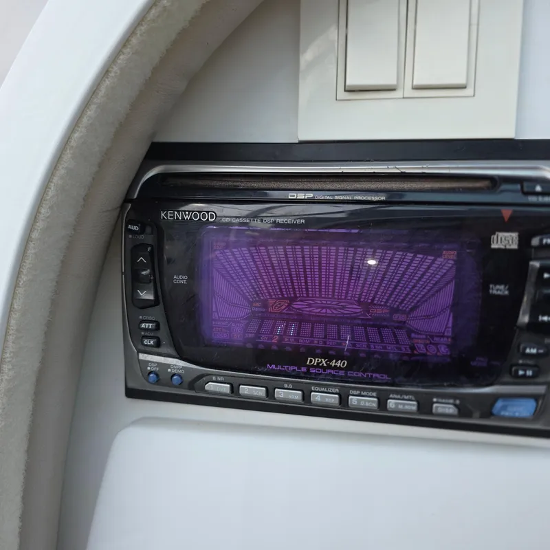 Slide: The Image of Kenwood DPX-440 stereo in 1998 Formula 33 Super Sun Sport boat dashboard. - 26