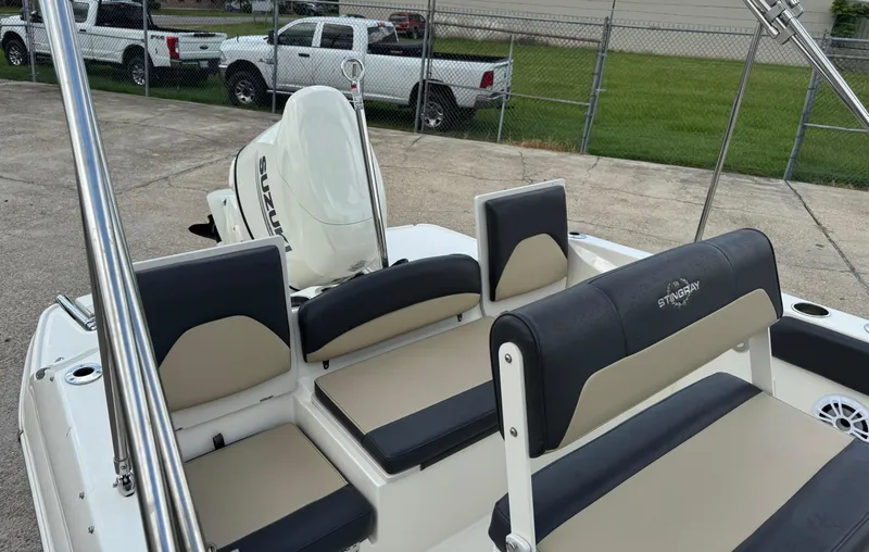 Slide: The Image of 2019 Stingray 186 CC boat interior with Suzuki engine, featuring comfortable seating and sleek design. - 20