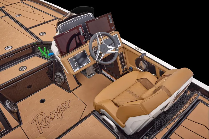 Slide: The Image of 2026 Ranger Z521R Ultra boat interior with tan leather seating and advanced dashboard controls. - 15