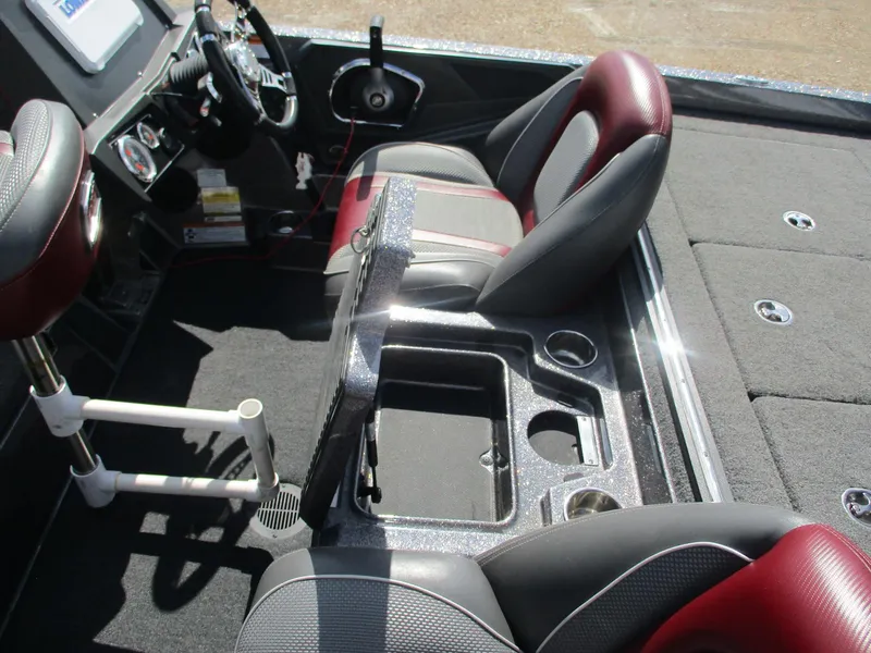 Slide: The Image of 2019 Ranger Z519L boat interior with seats, steering wheel, and storage compartments. - 15