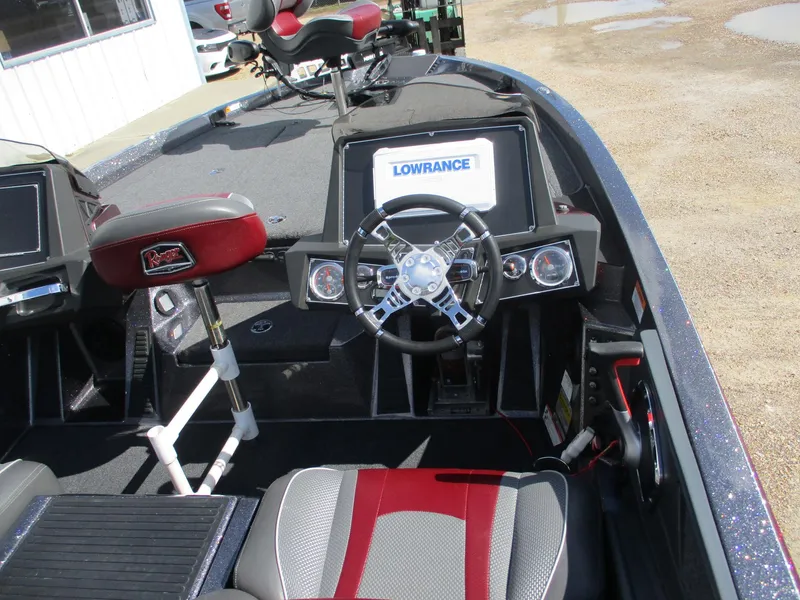 Slide: The Image of 2019 Ranger Z519L boat interior with steering wheel and Lowrance display. - 8
