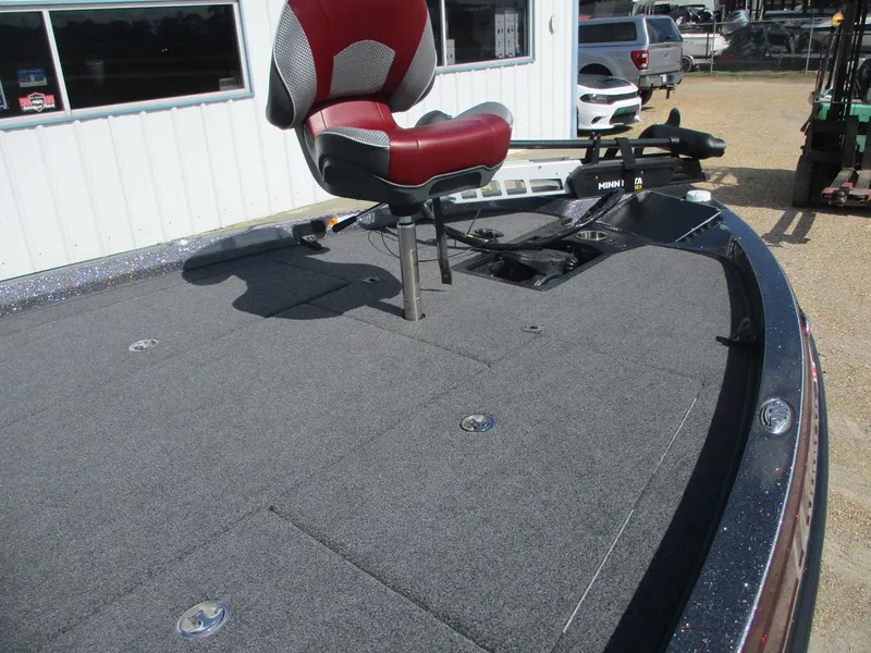 Slide: The Image of 2019 Ranger Z519L boat deck with red seat and Minn Kota trolling motor. - 9