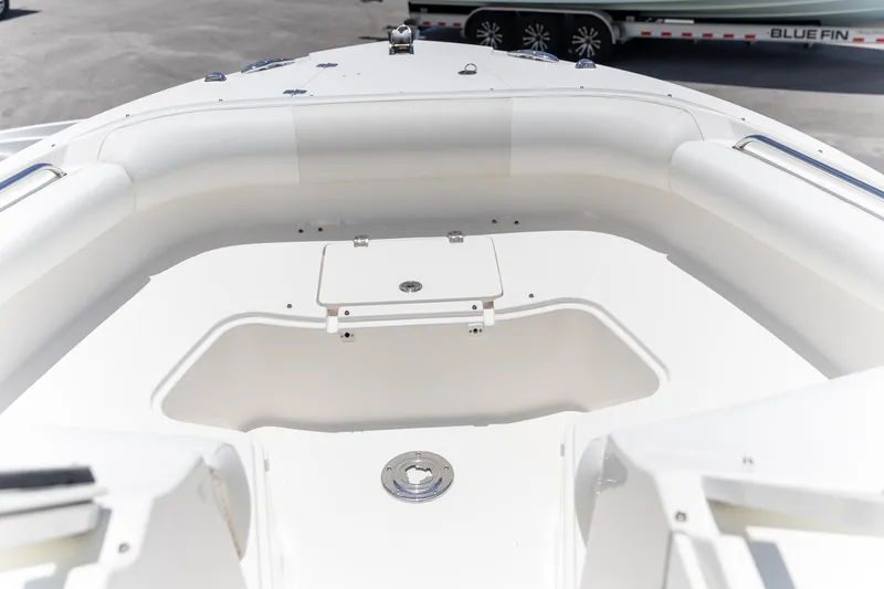 Slide: The Image of 2015 Edgewater 280 CX boat on stands, featuring Yamaha outboard motor. - 6