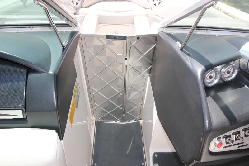 Slide: The Image of 2008 MasterCraft X-15 SS boat interior with dashboard and seating area. - 17