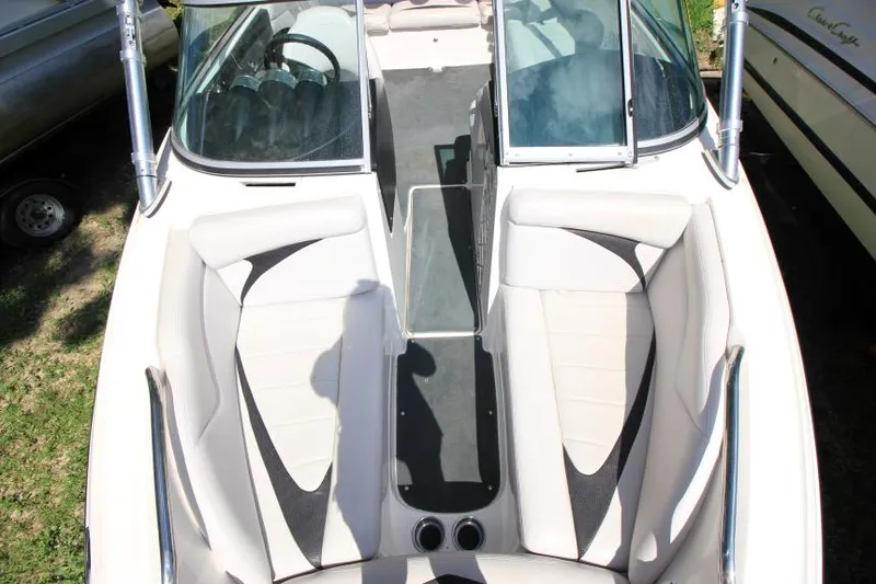 Slide: The Image of 2008 MasterCraft X-15 SS boat interior with white and black seating. - 19