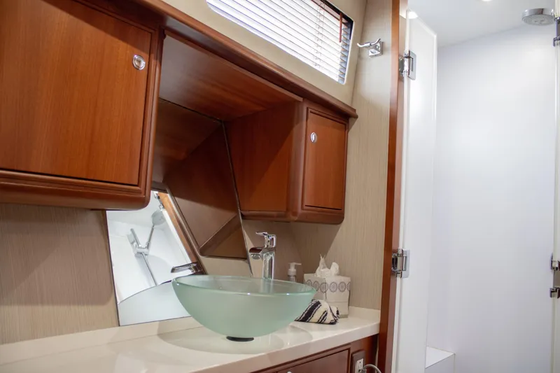 Slide: The Image of Luxurious bathroom interior of 2015 Huckins 45 yacht with modern glass sink. - 21