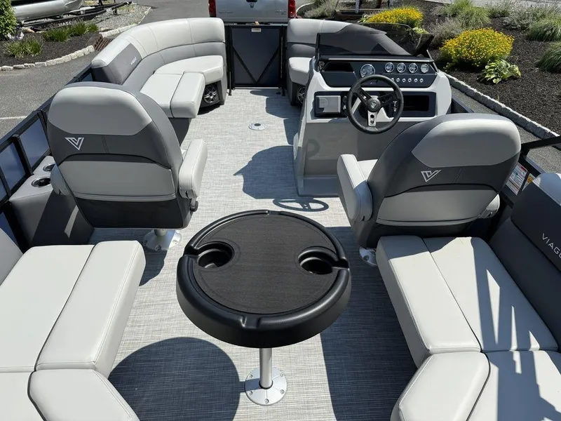 Slide: The Image of Luxurious 2026 Viaggio V18U boat interior with plush seating and modern steering console. - 7