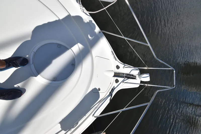 Slide: The Image of Bow view of 2007 Silverton 38 Convertible yacht on water. - 13