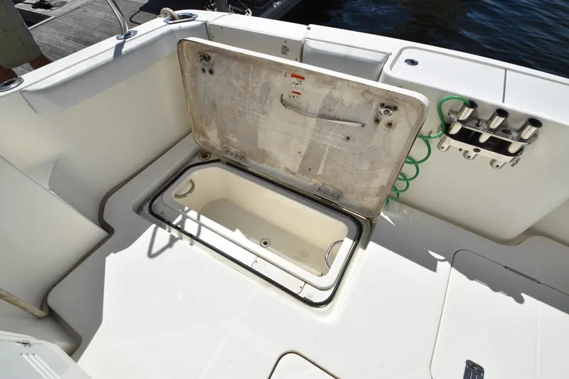 Slide: The Image of Open storage compartment on 2007 Silverton 38 Convertible boat deck. - 16
