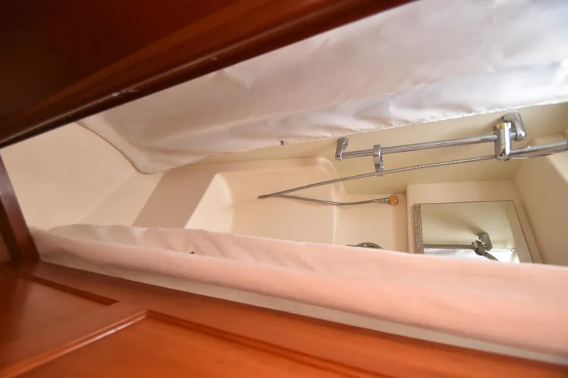 Slide: The Image of Bathroom interior of 2007 Silverton 38 Convertible yacht with shower and curtain. - 20