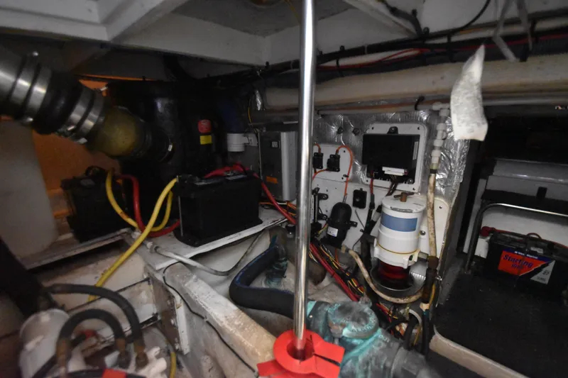 Slide: The Image of Engine room of a 2007 Silverton 38 Convertible boat, showcasing wiring and components. - 31