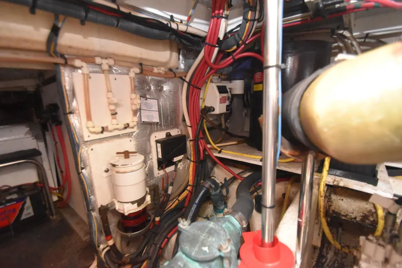 Slide: The Image of Engine room of 2007 Silverton 38 Convertible with wiring and mechanical components. - 33