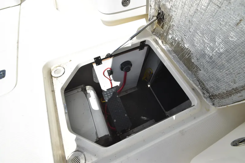 Slide: The Image of Open hatch on 2007 Silverton 38 Convertible boat, revealing internal compartment and wiring. - 40