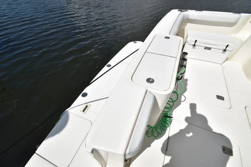 Slide: The Image of 2007 Silverton 38 Convertible boat deck with storage and water hose. - 9
