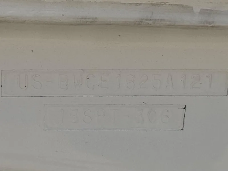 Slide: The Image of Hull identification number on a 2021 Boston Whaler 130 Super Sport boat. - 16