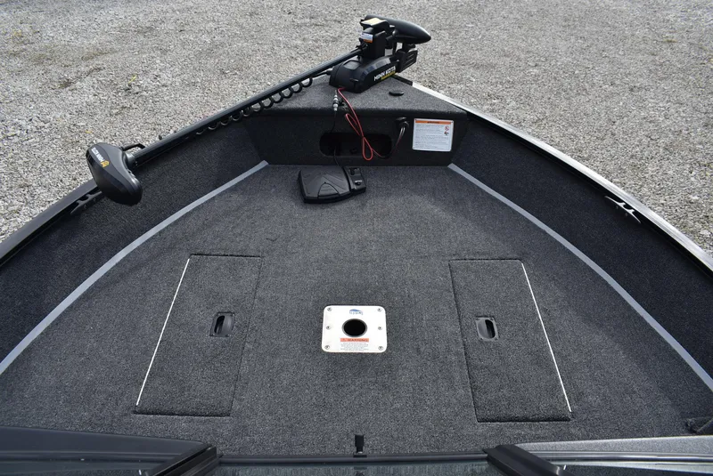 Slide: The Image of 2025 Lowe FM 1675 WT boat deck with trolling motor and storage compartments. - 11
