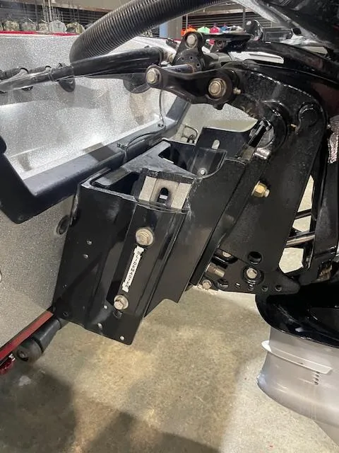 Slide: The Image of 2023 Triton 20 TRX Patriot boat engine mount detail in a workshop setting. - 8