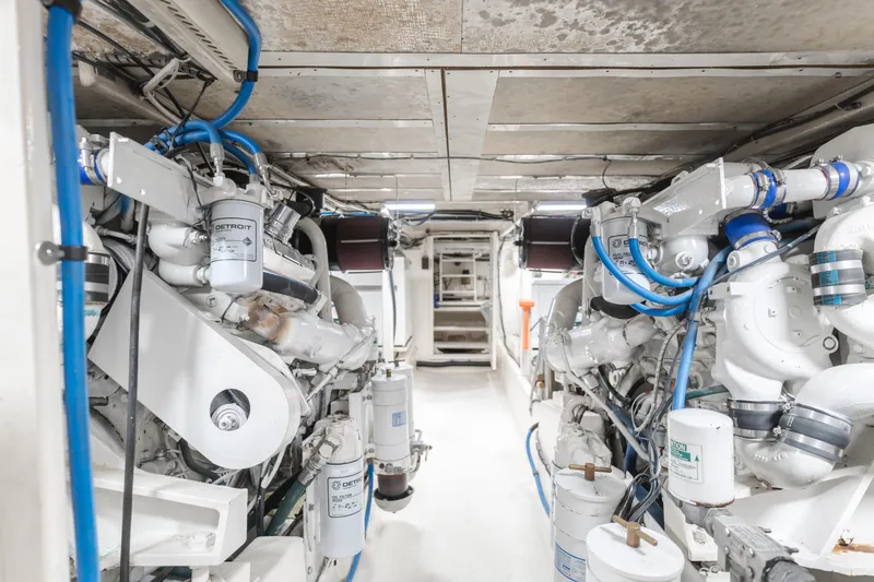 Slide: The Image of Engine room of a 1984 Vic Franck pilothouse yacht, featuring Detroit diesel engines. - 24