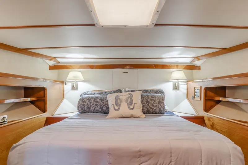 Slide: The Image of Luxurious 1984 Vic Franck pilothouse bedroom with elegant wood accents and cozy bedding. - 35
