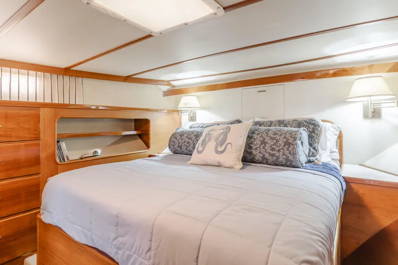 Slide: The Image of Luxurious 1984 Vic Franck pilothouse bedroom with elegant wood finish and cozy bedding. - 36