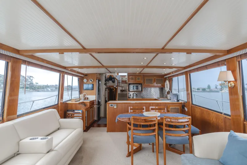 Slide: The Image of Luxurious 1984 Vic Franck pilothouse interior with elegant wood finishes and spacious seating area. - 43