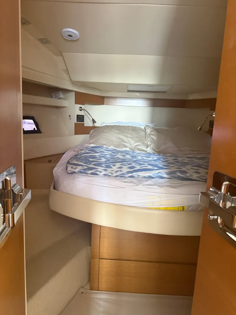 Slide: The Image of Luxurious cabin interior of 2018 Azimut 42 Fly yacht with cozy bed. - 15