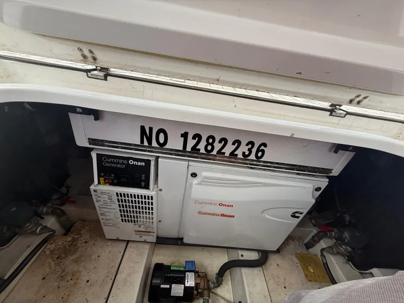 Slide: The Image of Cummins Onan generator in 2018 Azimut 42 Fly yacht engine compartment. - 28