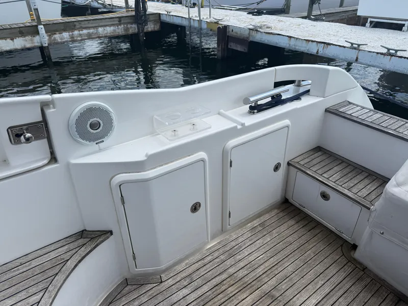 Slide: The Image of Azimut 42 Fly 2018 yacht deck with storage compartments and speaker. - 35