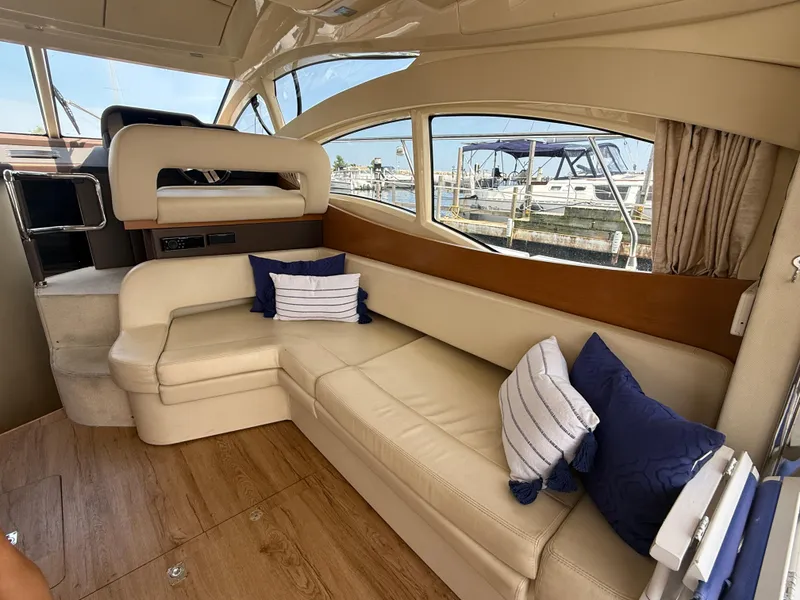 Slide: The Image of Luxurious interior of 2018 Azimut 42 Fly yacht with plush seating and nautical decor. - 5