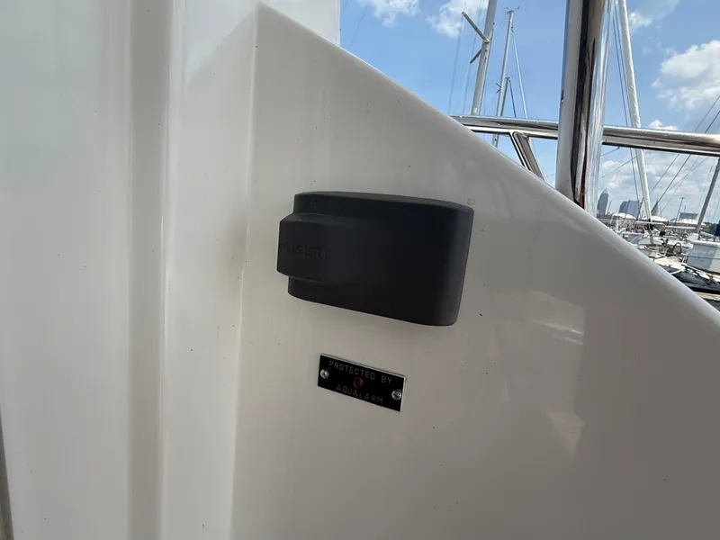 Slide: The Image of Azimut 42 Fly 2018 yacht detail with Fusion speaker and marina background. - 6