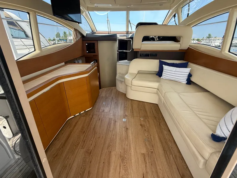 Slide: The Image of Luxurious interior of 2018 Azimut 42 Fly yacht with elegant seating and wooden flooring. - 7