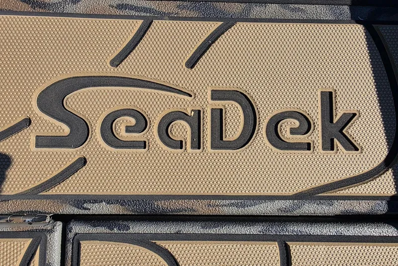 Slide: The Image of SeaDek logo on Xpress X23 Bay boat flooring, featuring Yamaha Vmax 250 SHO, 2026 model. - 13