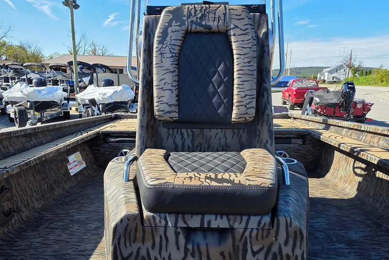 Slide: The Image of 2026 Xpress X23 Bay boat with Yamaha Vmax 250 SHO, featuring camo seating. - 17