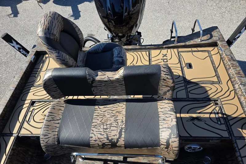 Slide: The Image of 2026 Xpress X23 Bay boat interior with Yamaha Vmax 250 SHO engine, featuring camo-patterned seating. - 21