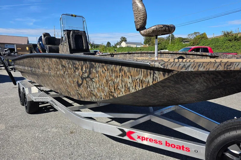 Slide: The Image of 2026 Xpress X23 Bay boat with Yamaha Vmax 250 SHO, camo design on trailer. - 9