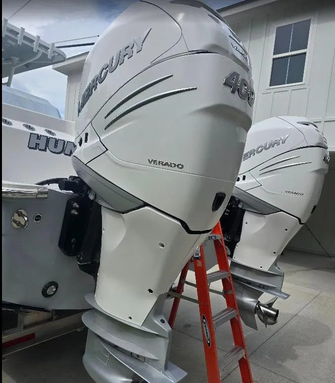 Slide: The Image of Twin Mercury Verado 400 engines on a 2022 Invincible 33 Catamaran. - 12