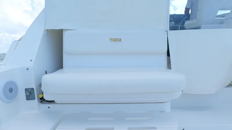 Slide: The Image of White seating area on a 2000 Tiara Yachts 3700 Open boat. - 13